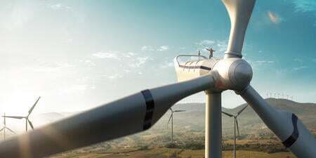 Wind turbine at sunset