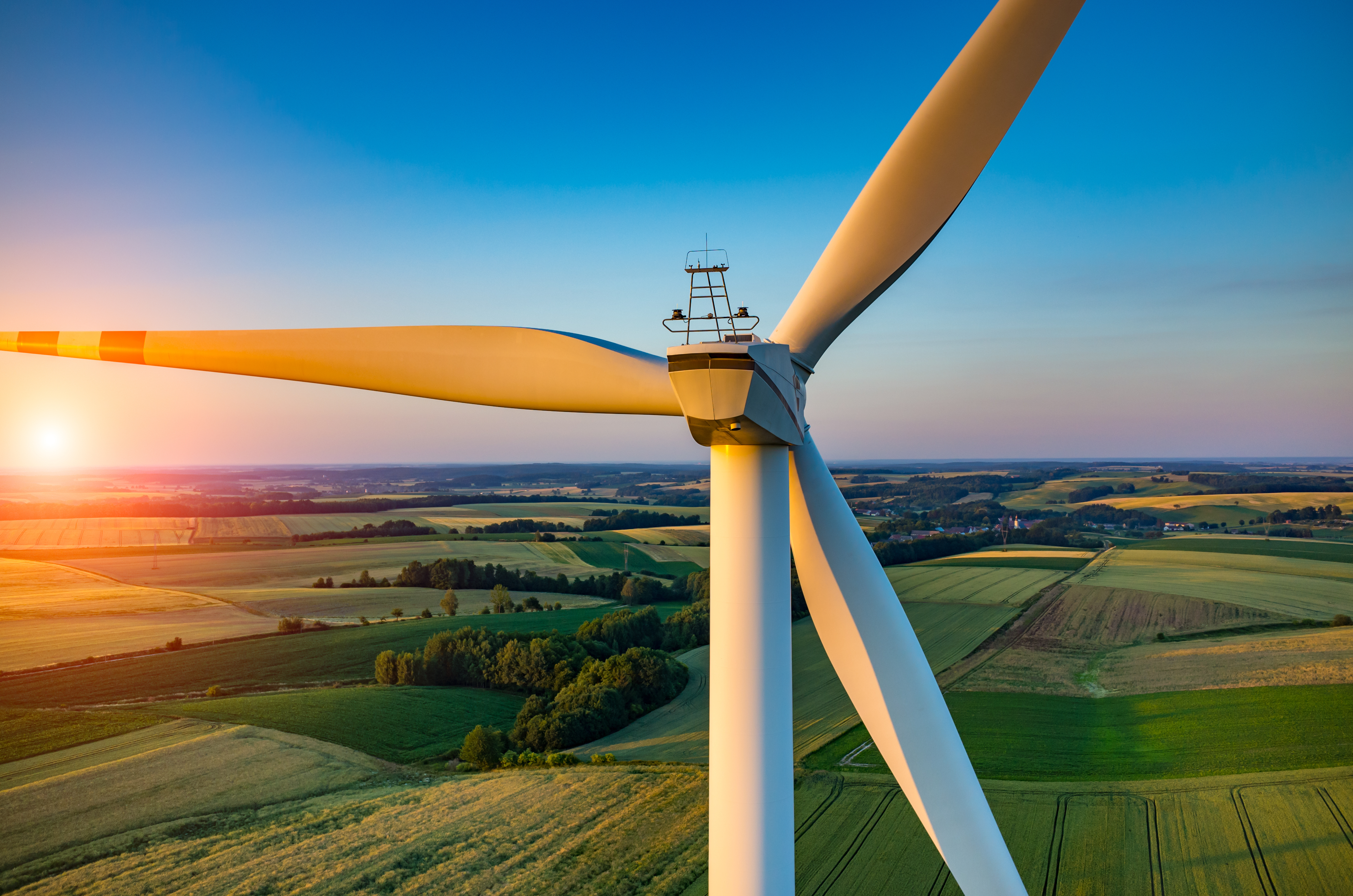 Wind mill overlooking fields